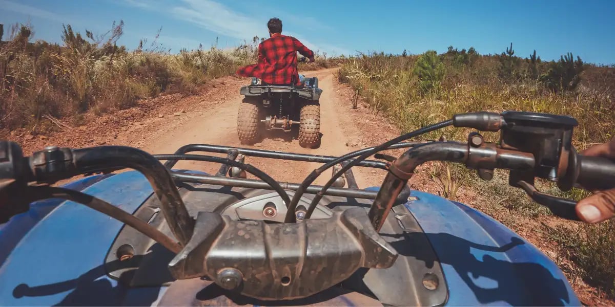 Man driving off road on an ATV