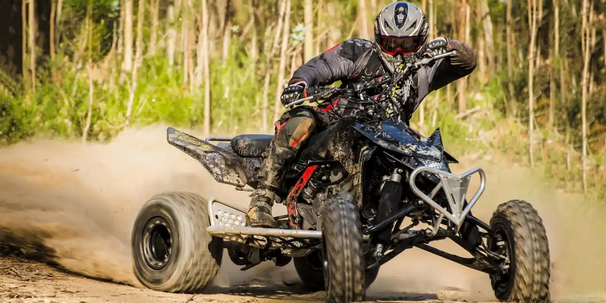 ATV racer takes a turn during a race.