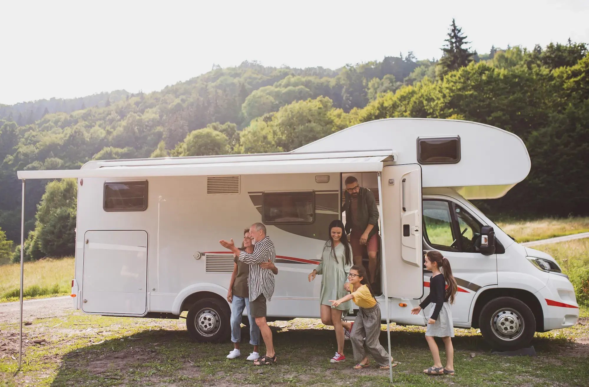 Family-enjoying-road-trip-in-scenic-wilderness
